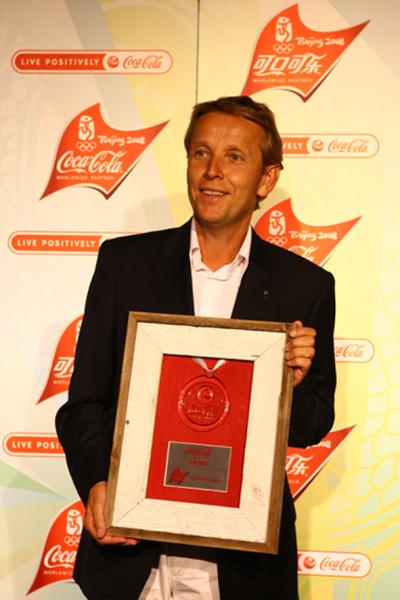 Sportstaatssekretär Dr. Reinhold Lopatka bei der Verleihung des "Live positively Award" in Peking (C) Coca Cola